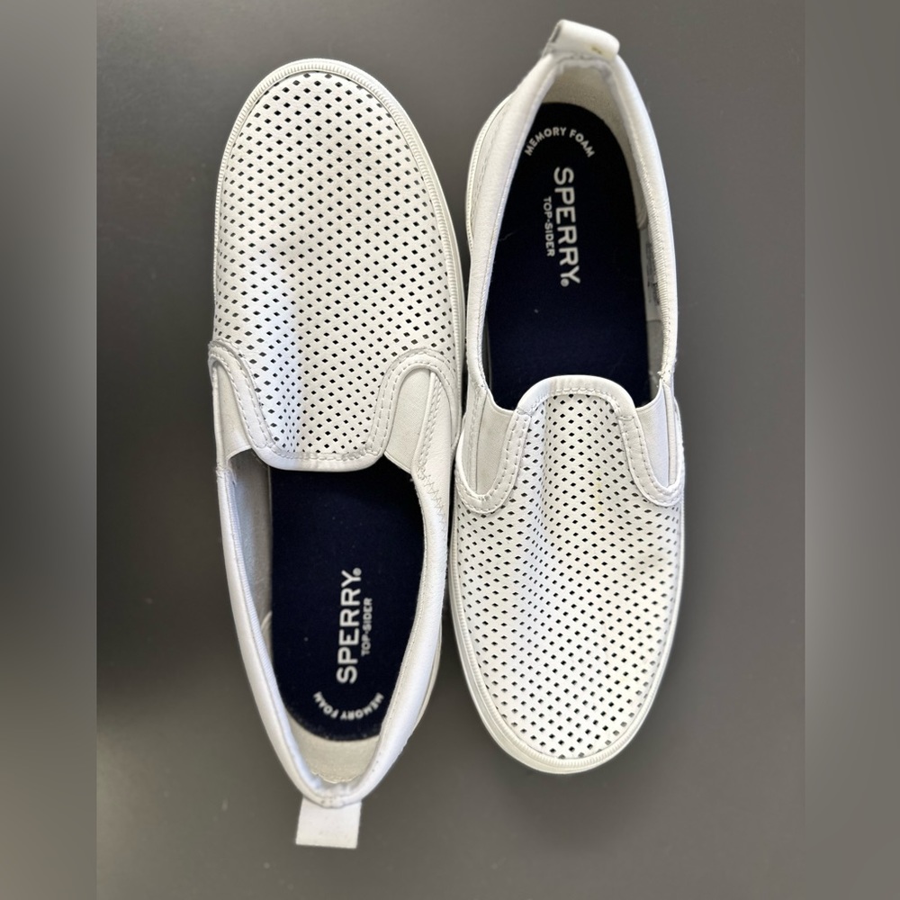 White Sperry slip on